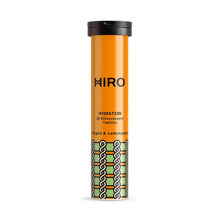 HIRO hydration tablet tube with orange and green design on a white background