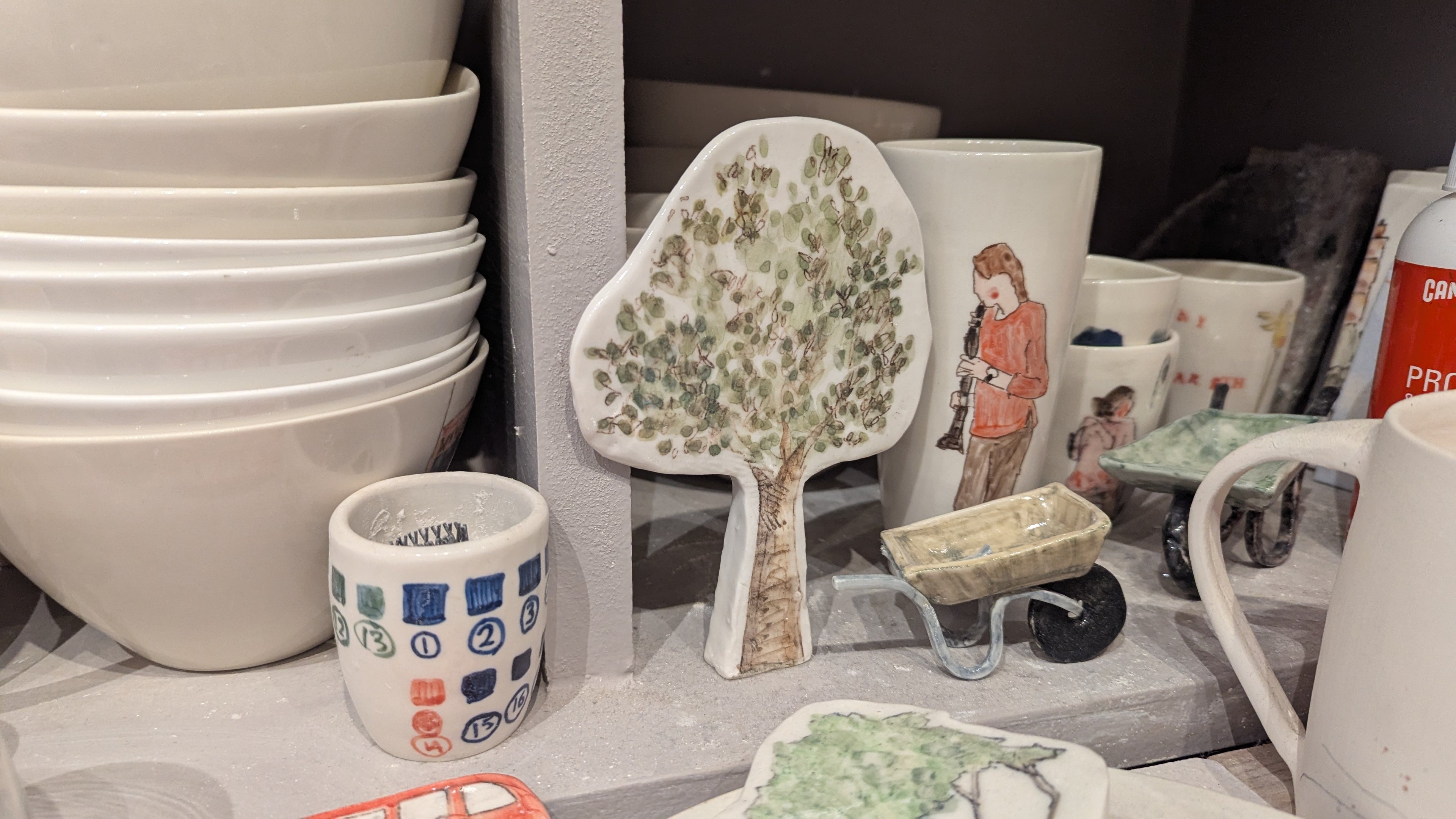 Collectables: Ceramic Bus + Bicyclist Beaker