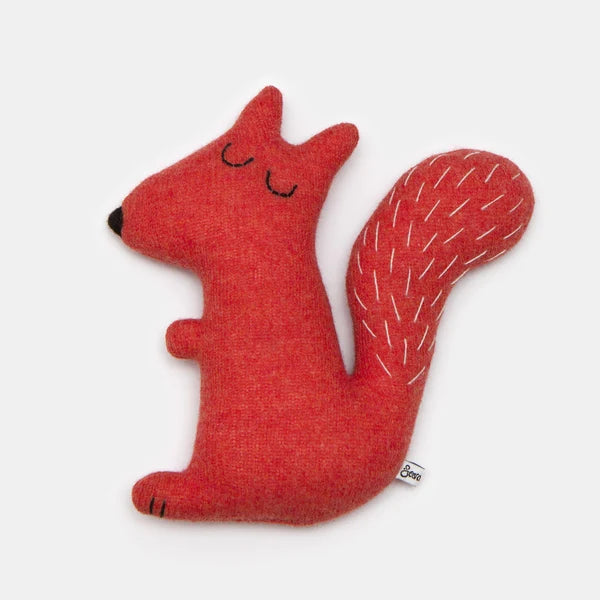 Little soft toy orange squirrel